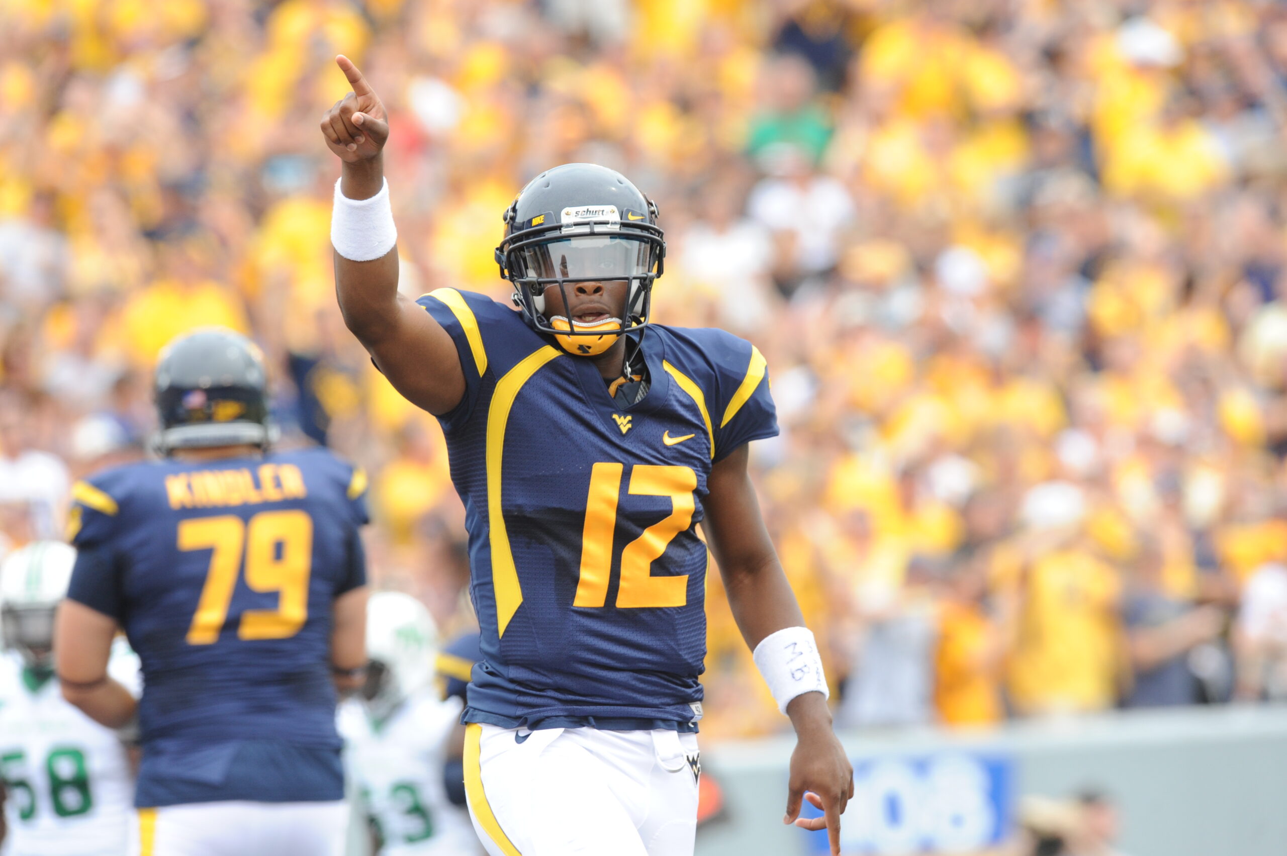 Geno Smith Records First TD of the Season - Sports Illustrated West  Virginia Mountaineers News, Analysis and More