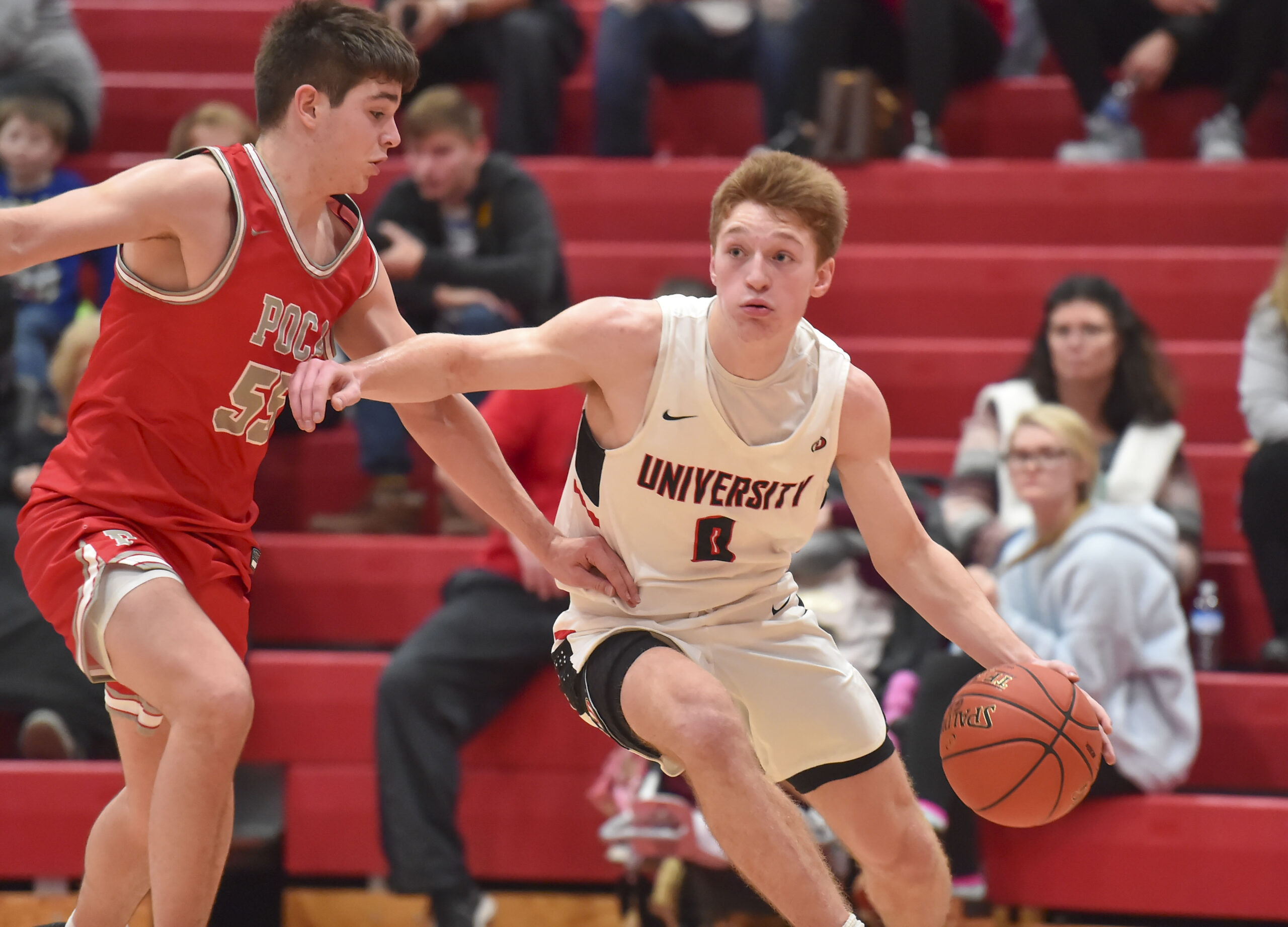 University's K.J. McClurg (0) scored 16 points in the fourth quarter, but his defense against Poca was what caught everyone's attention (William Wotring/The Dominion Post)