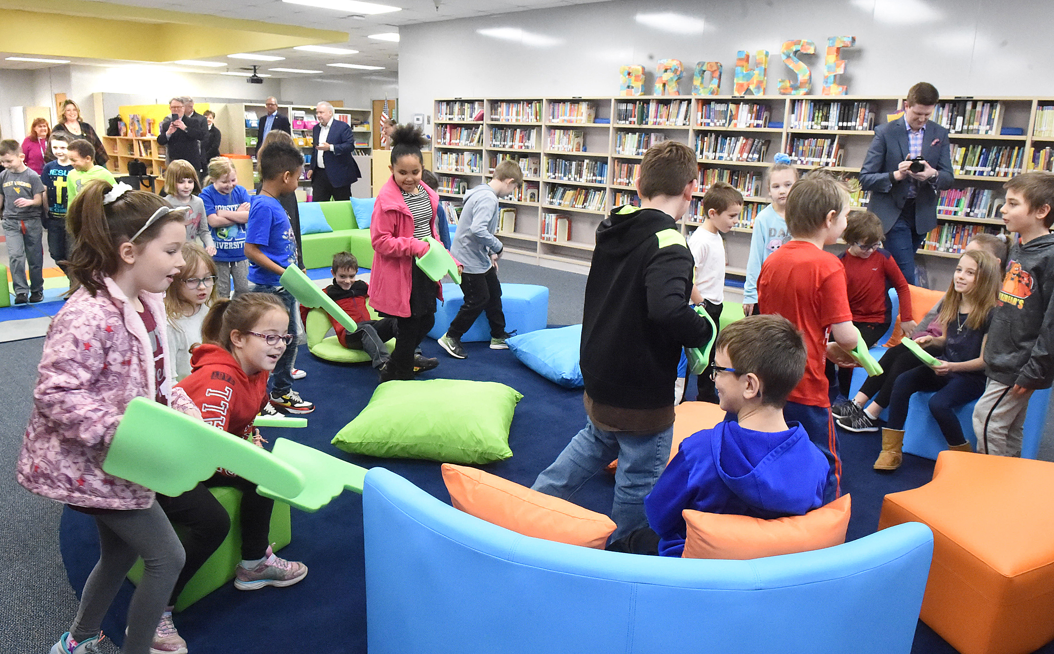 Second-graders at Mountainview Elementary see their newly upgraded library for the first time.
