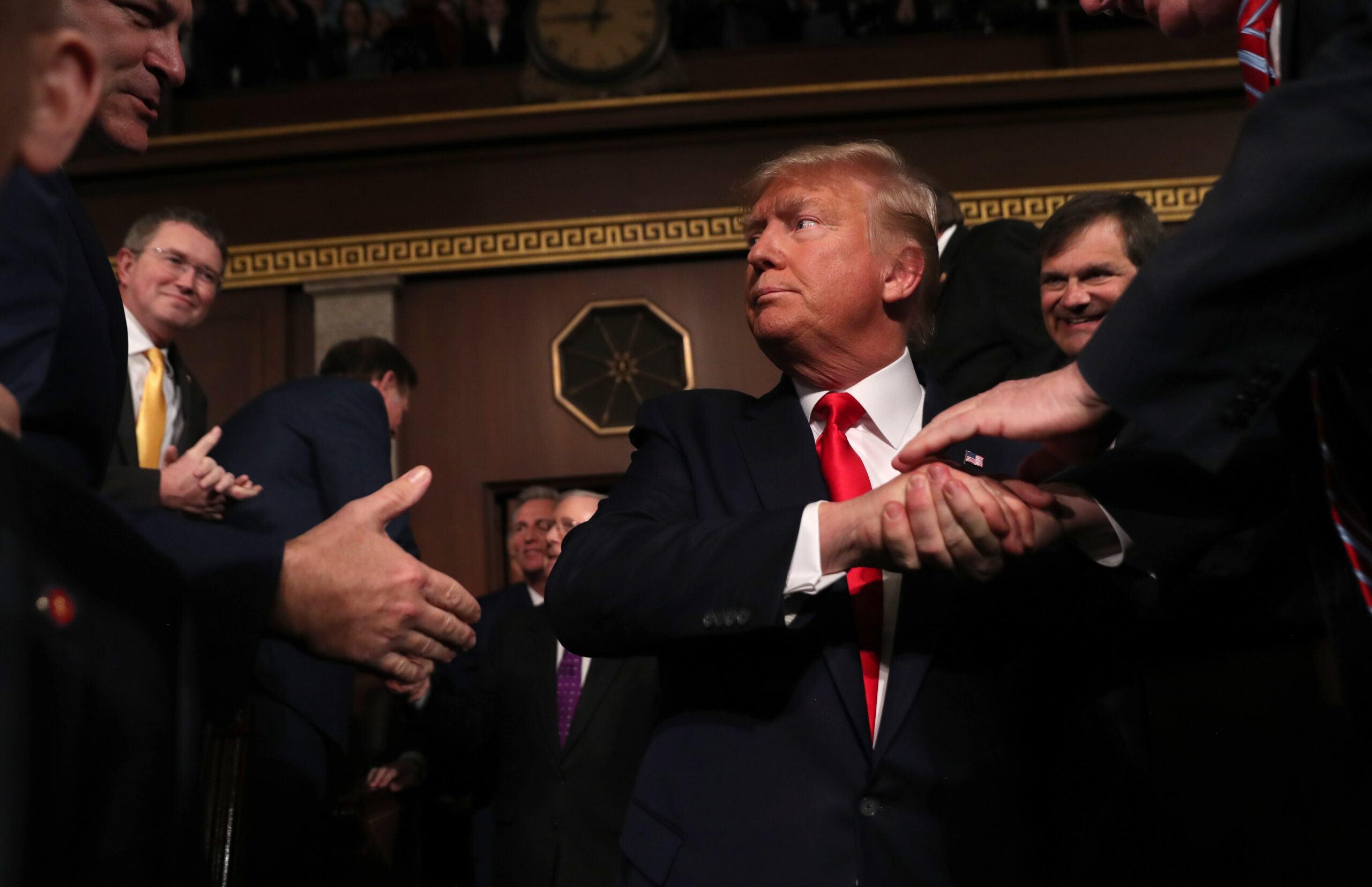 President Trump shakes hands