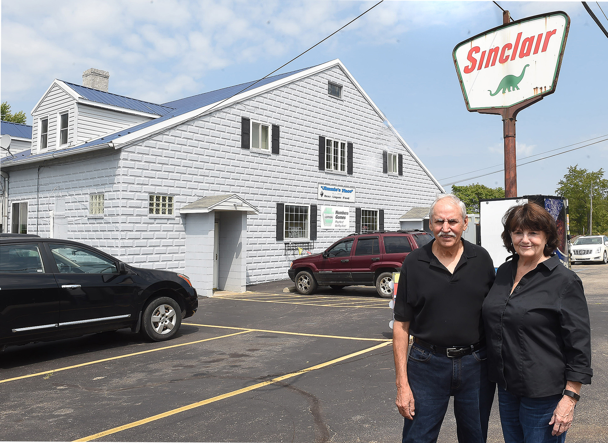 Louis and Becky Vecchio stand in front of Jimmie’s Place