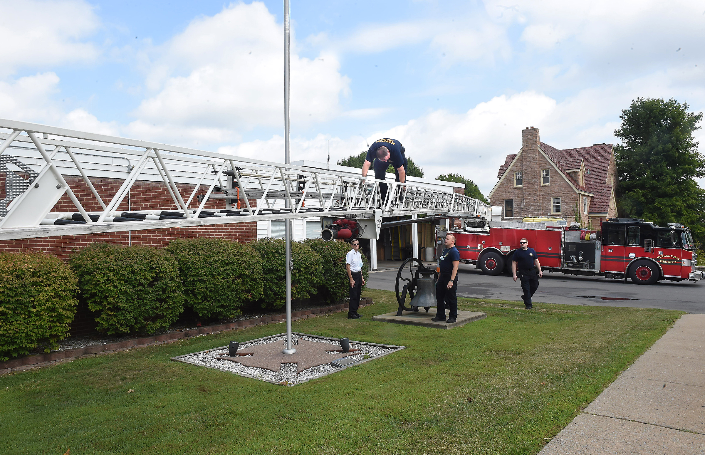 firefighters test ladder at South High Street station
