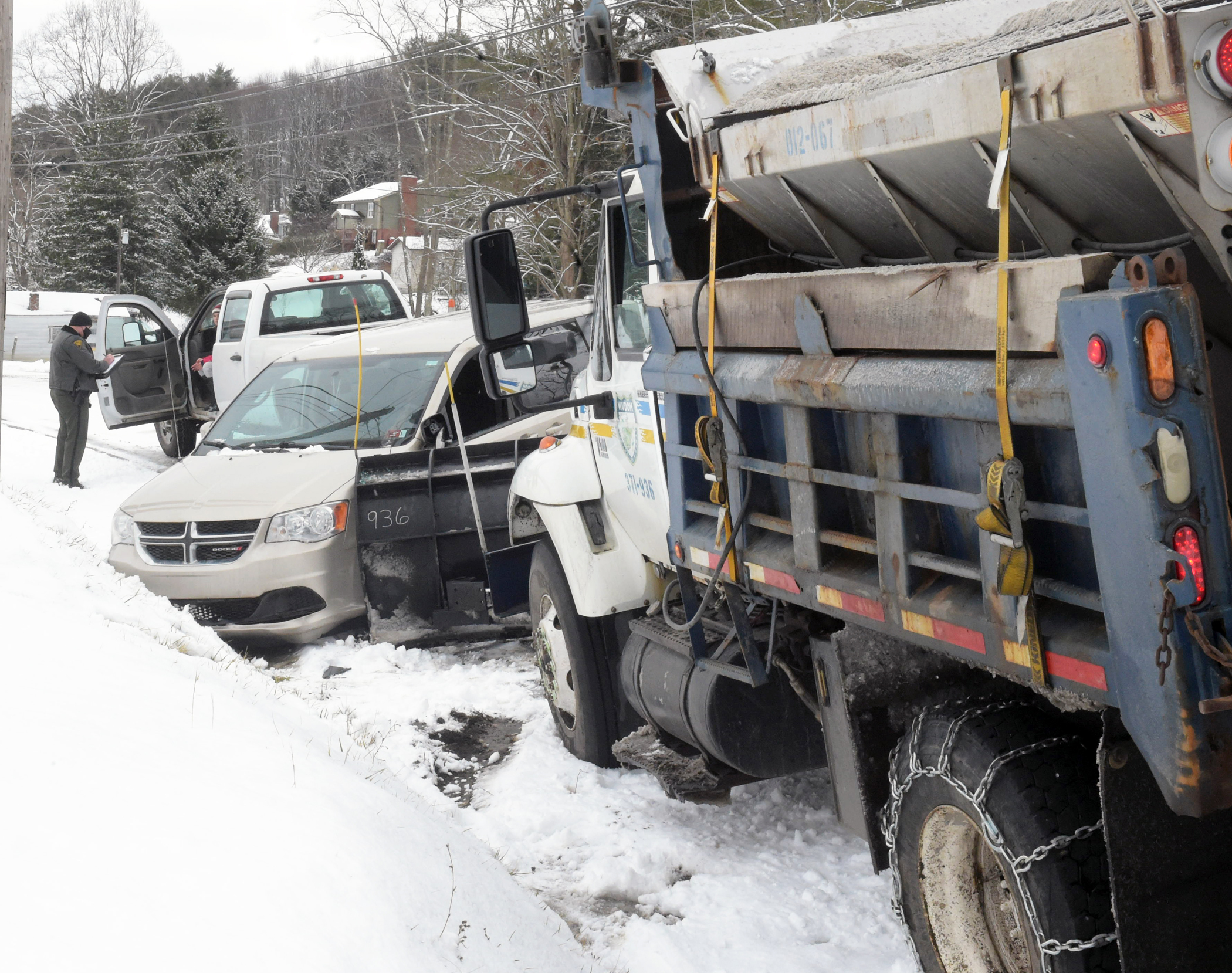 state plow truck collides with a van
