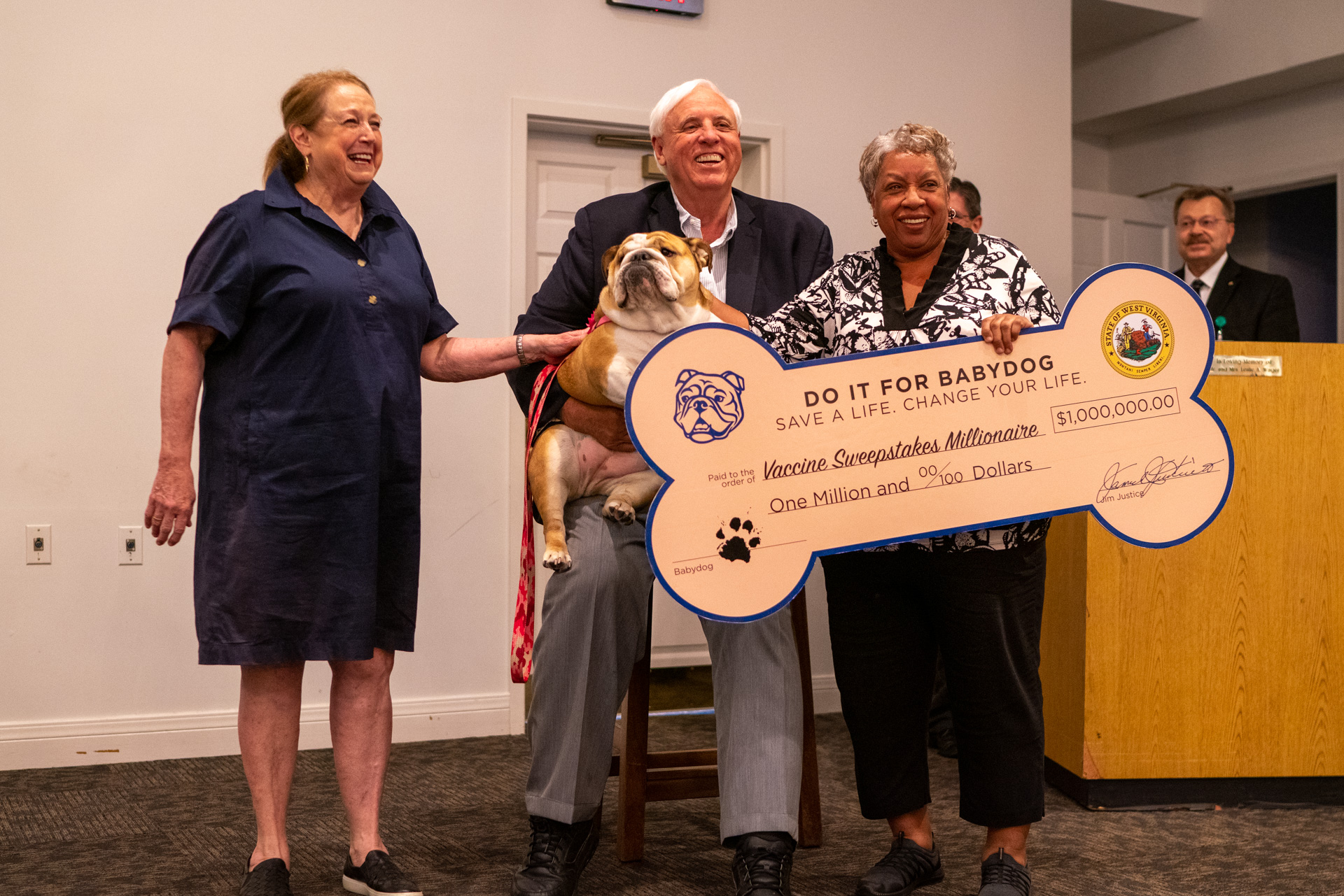 Wanda Coleman is presented with a novelty check