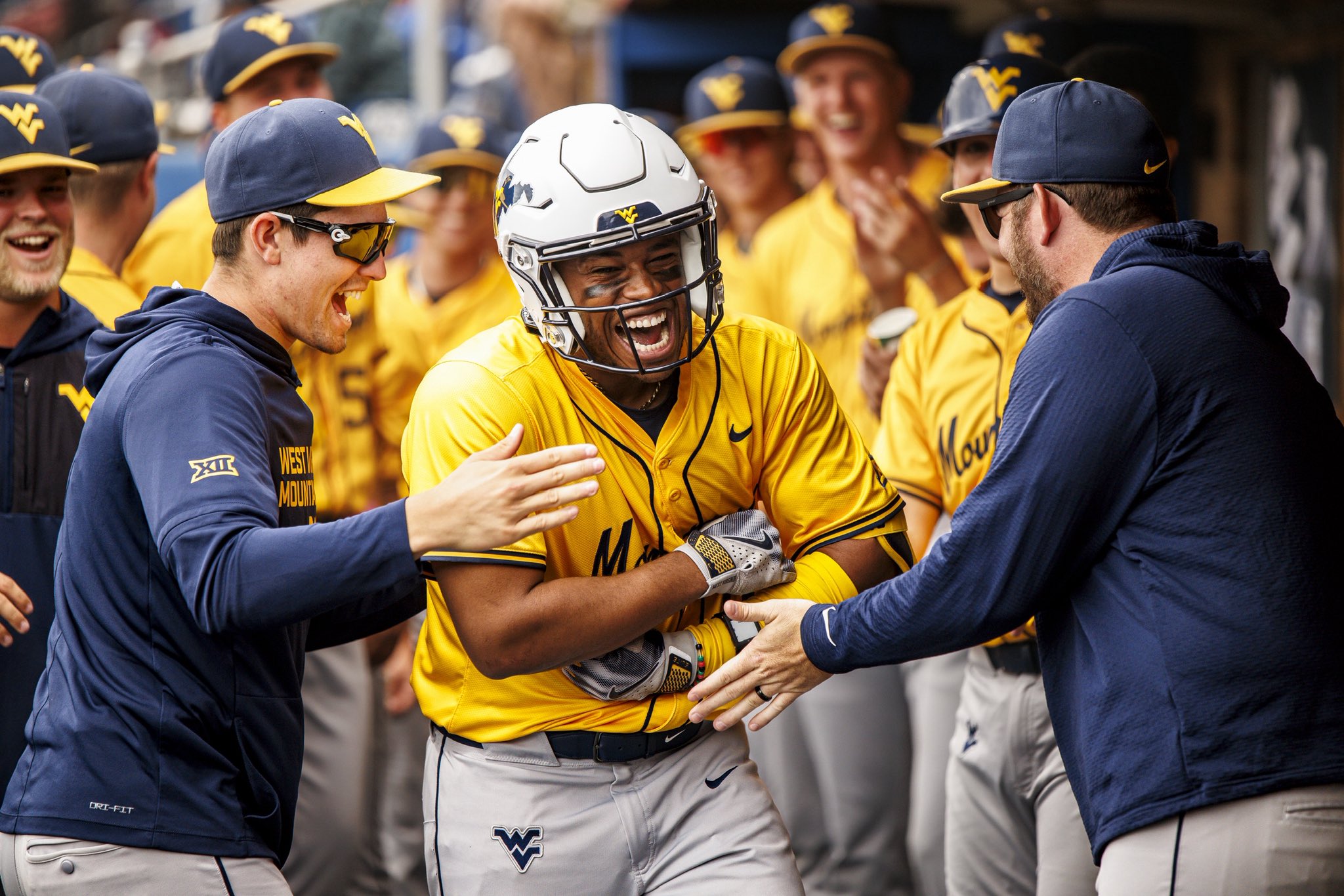 That’s a sweep: No. 15 WVU mercy rules No. 7 Kansas, 13-2